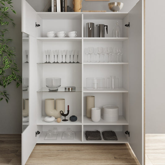 Open white cabinet with shelves displaying various items against a gray wall.