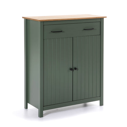 A sage green wooden storage cabinet with a natural light wood top, featuring a single drawer with black handles and two paneled doors with round black knobs, shown on a white background.
