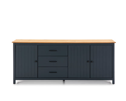 A modern sideboard cabinet with a light natural wood top, three drawers in the center, and two paneled doors on either side, finished in a dark navy blue color.
