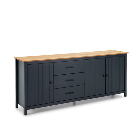 A modern sideboard cabinet with a dark navy blue paneled body, three central drawers, and a light natural wood top, shown on a plain white background.
