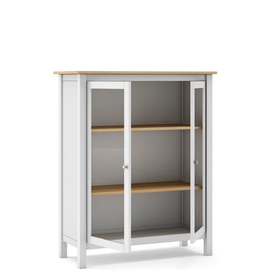 A white storage cabinet with a light wood top and three wooden shelves, featuring glass doors with white frames, shown on a solid white background.