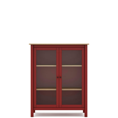 A red wooden cabinet with two glass doors, two interior shelves, and a light natural wood top, shown against a plain white background.
