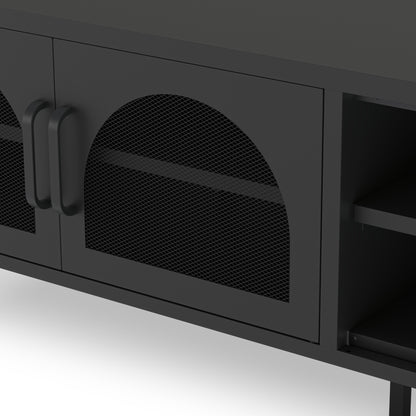 Close-up of a modern black cabinet with mesh-patterned doors and dark metal handles, showing part of an open shelf on the right.