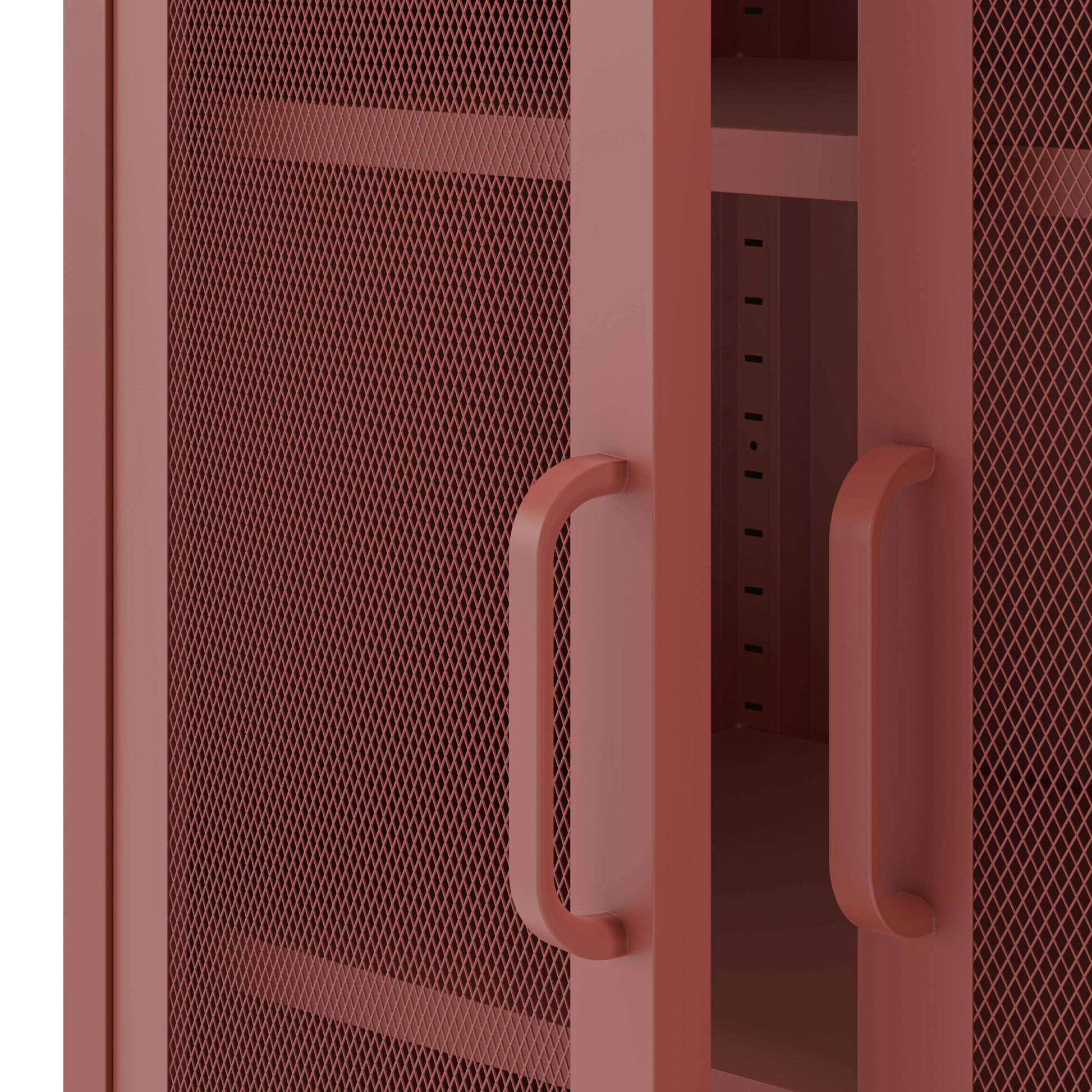 Close-up of a dusty rose metal storage cabinet with a perforated mesh door, a solid side panel, and matching curved handles.