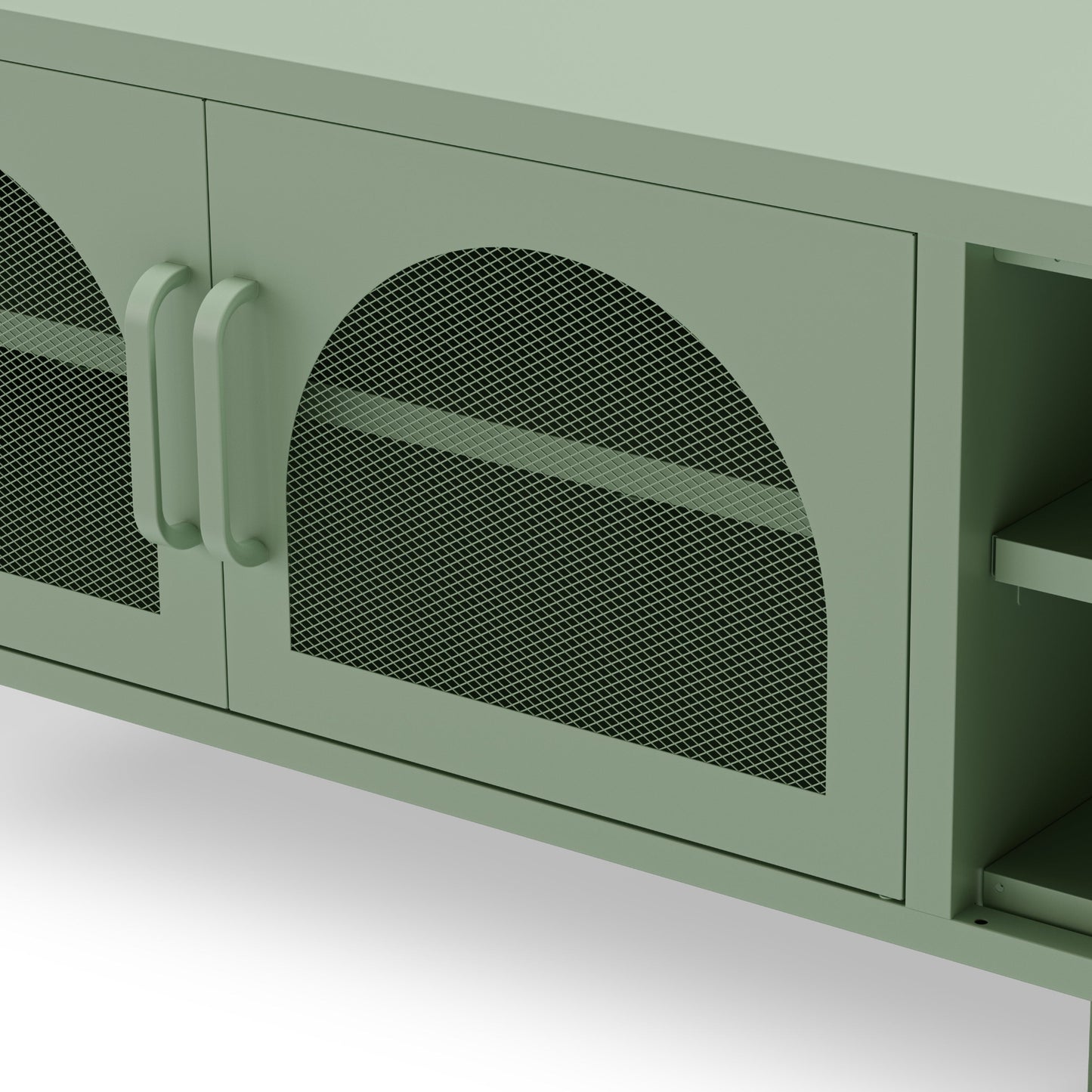 A close-up of a sage green cabinet with two doors featuring arched black mesh panels and matching curved handles.
