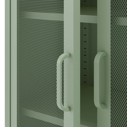 Close-up of a storage cabinet or shelf unit with two light sage green doors featuring a fine mesh pattern and matching curved handles.