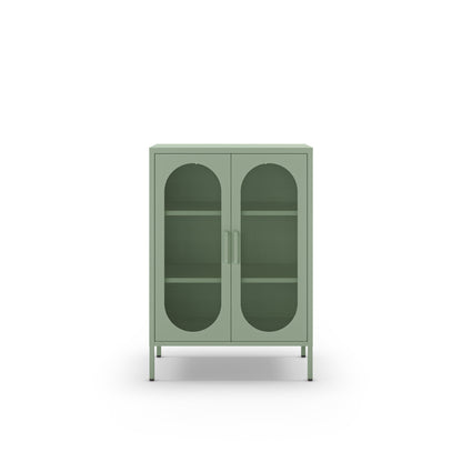 A sage green metal cabinet with two arched glass doors and two interior shelves, shown against a plain white background.
