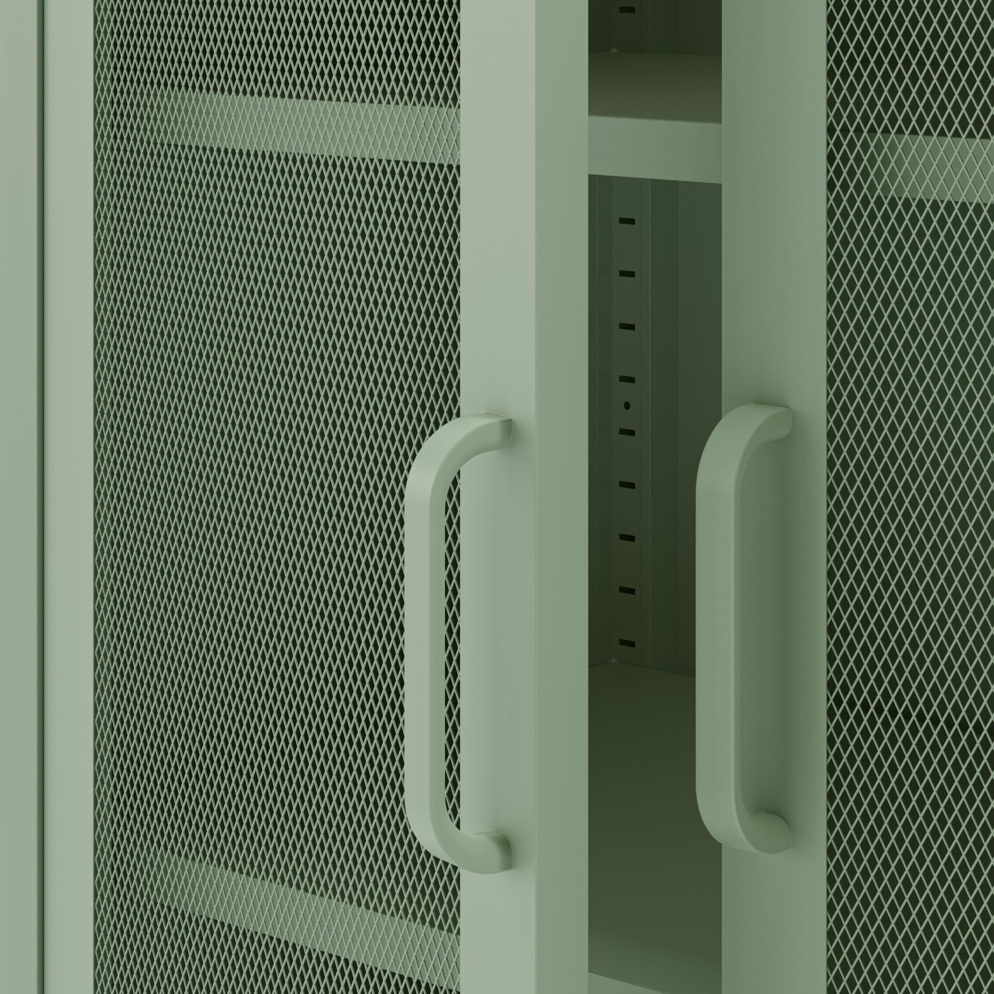 Green metal cabinet with mesh doors and handles on a white background
