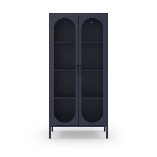 A tall, dark navy blue cabinet with two arched glass doors, three interior shelves, and slim metal legs, shown against a plain white background.