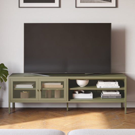 An olive green TV stand with glass-front cabinets and open shelves, holding a large black television, styled in a modern living room setting with a wooden floor and a sofa in the foreground.