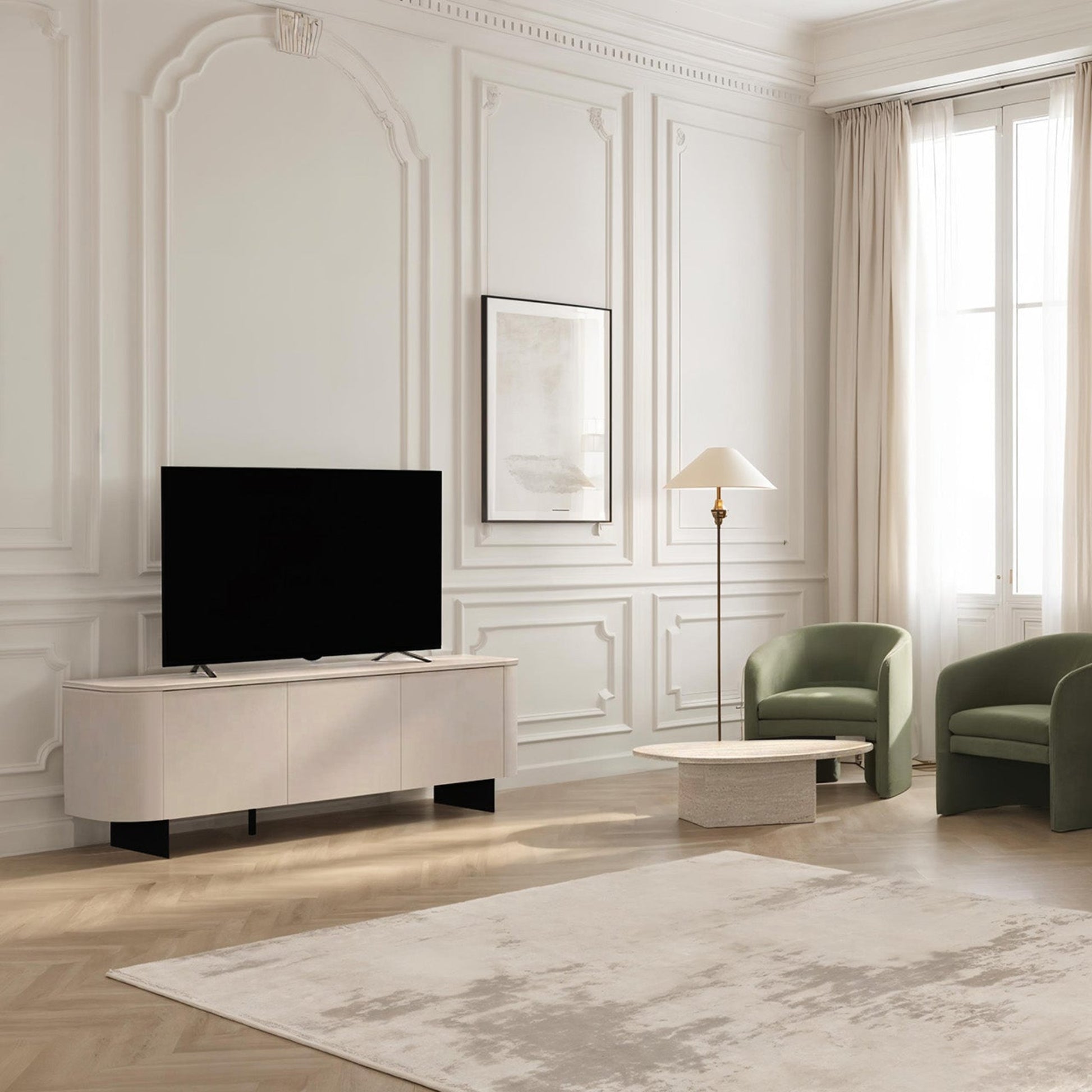 Modern living room with a TV, armchairs, and a cabinet.