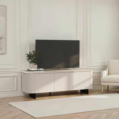 Modern living room with a television on a wooden stand, a chair, and decorative elements.