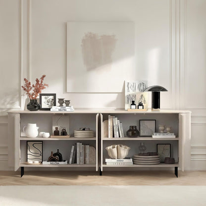 Modern interior with a wooden sideboard displaying decorative items in a well-lit room.