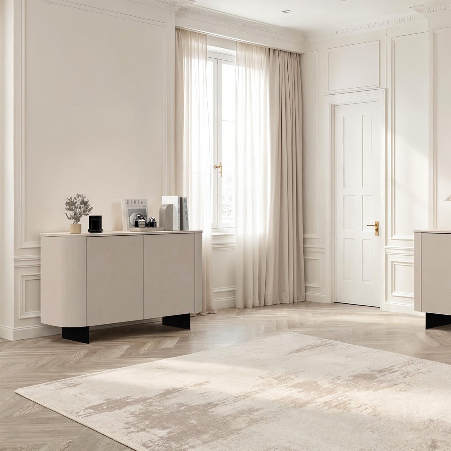 Modern interior with light-colored furniture and decor elements.