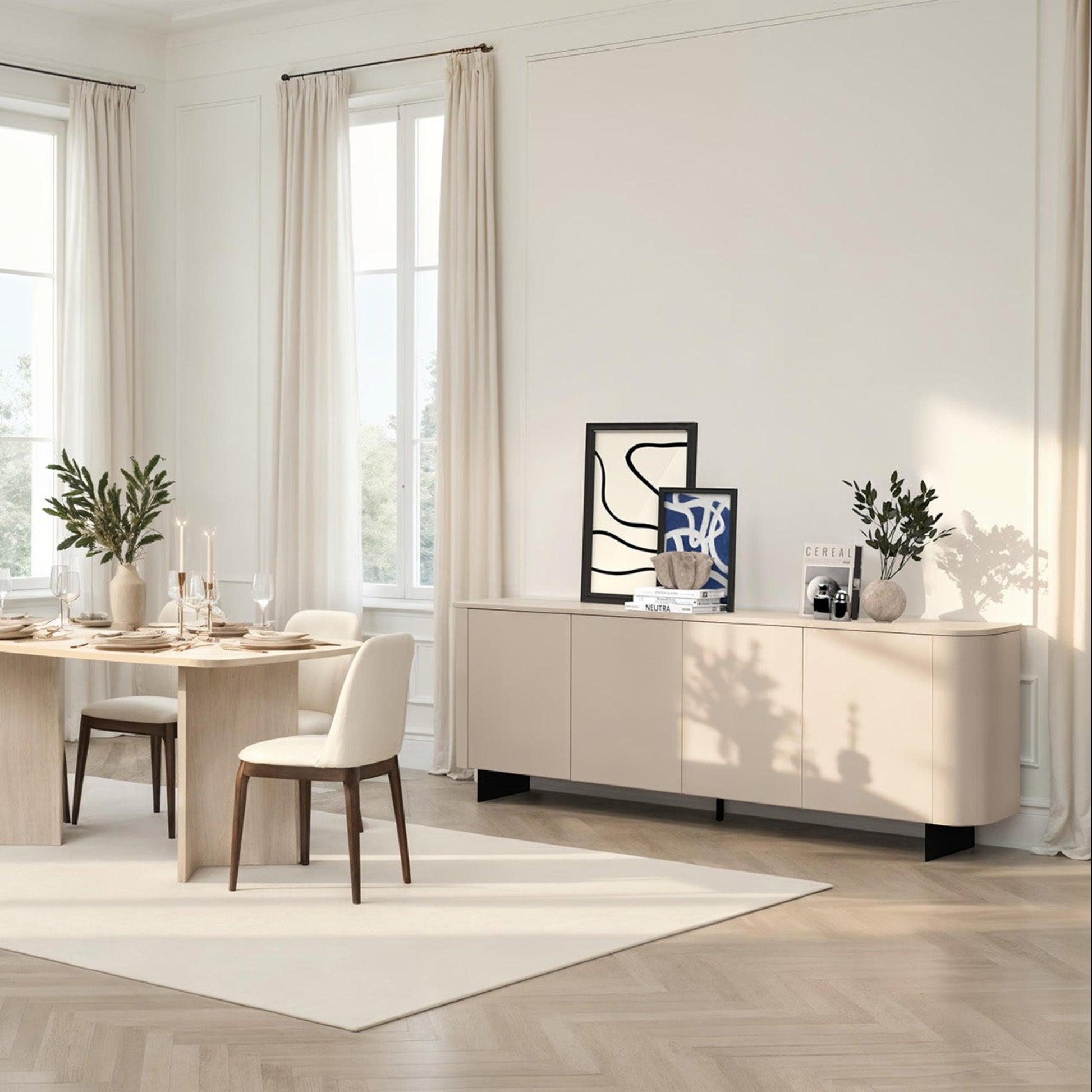 Modern dining room with light wood furniture and large windows.