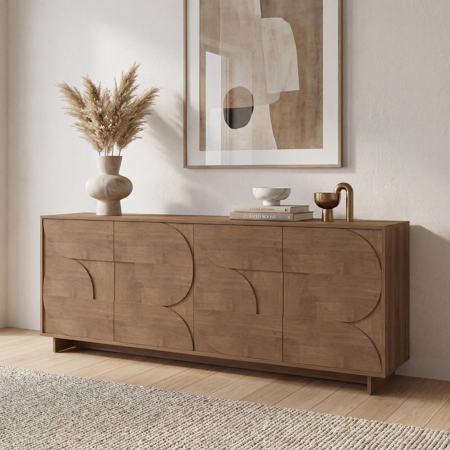Wooden sideboard in a modern room with abstract art and decor items.