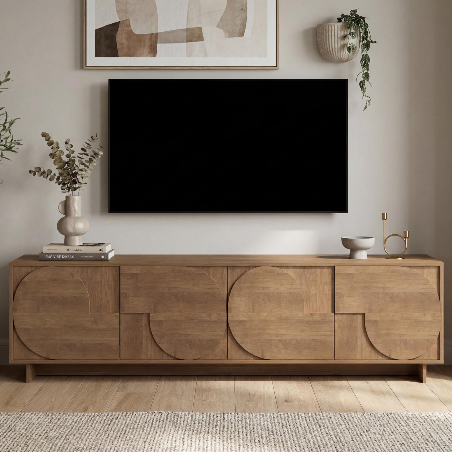 Wooden sideboard with a television above it in a living room setting.