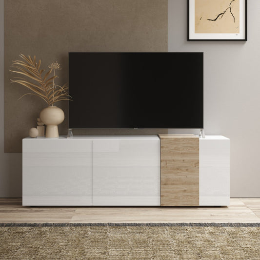 Modern living room with a television on a white and wood entertainment console, decorative wall art, and plants.