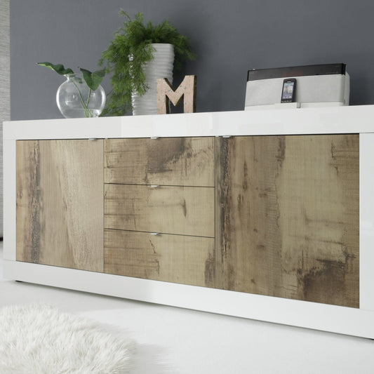 White cabinet with wooden panel doors in a room setting.