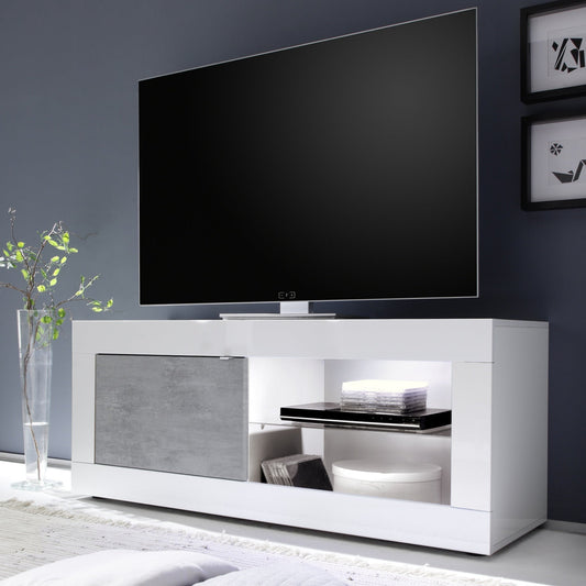 Modern white TV stand with a large flat-screen TV against a dark gray wall.