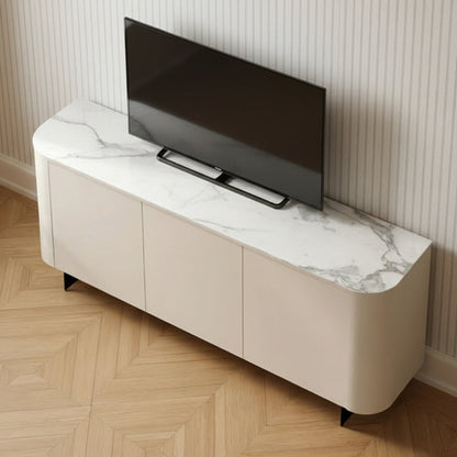 A modern low-profile media console with a cream-colored cabinet and a white marble-patterned top, shown in a room setting with a wood herringbone floor and a black flat-screen TV on top.