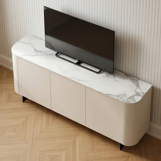 A modern low-profile media console with a cream-colored cabinet and a white marble-patterned top, shown in a room setting with a wood herringbone floor and a black flat-screen TV on top.