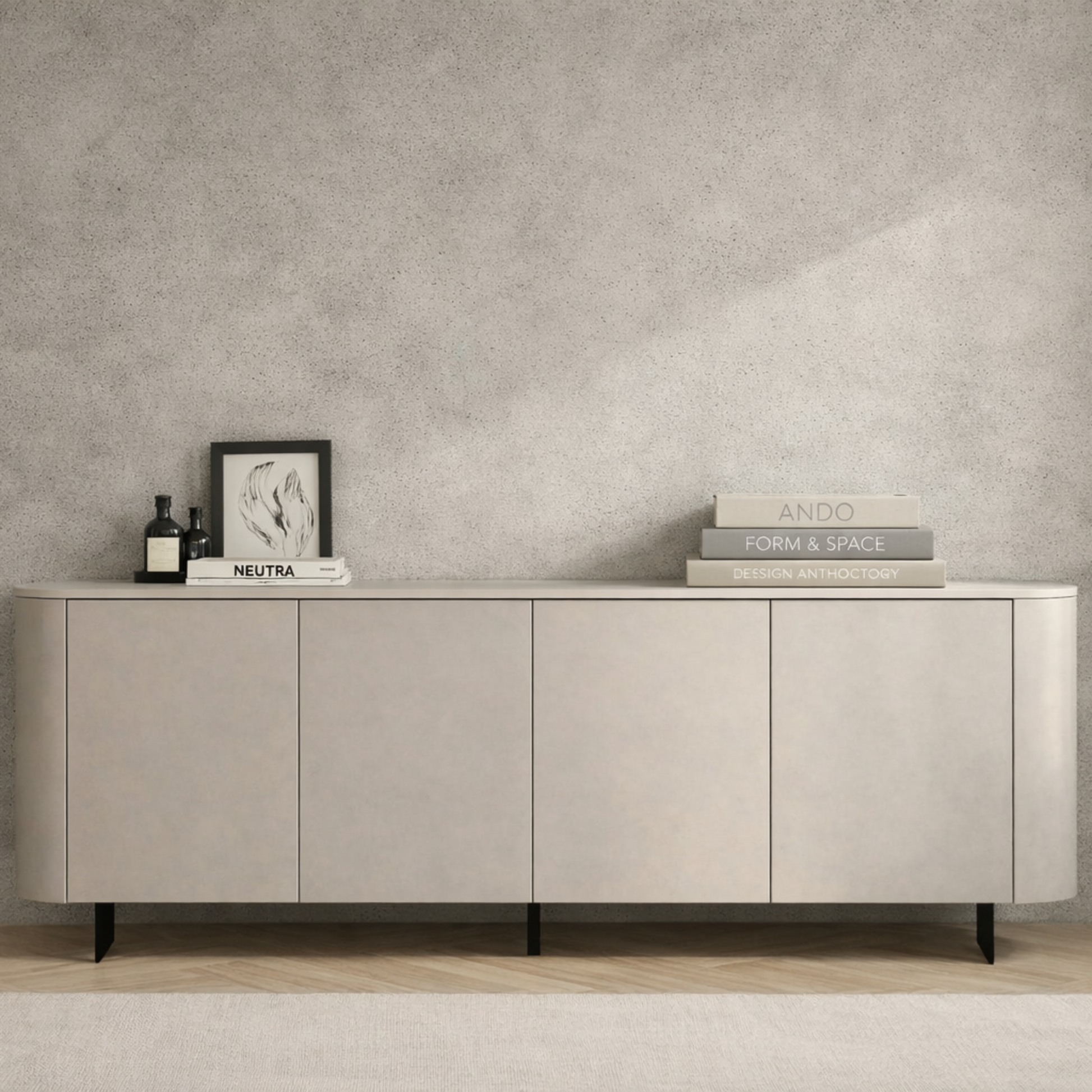 A modern sideboard cabinet with a light beige wood-grain finish and black legs, styled in a minimalist room with a textured gray wall, wooden floor, and white curtains.
