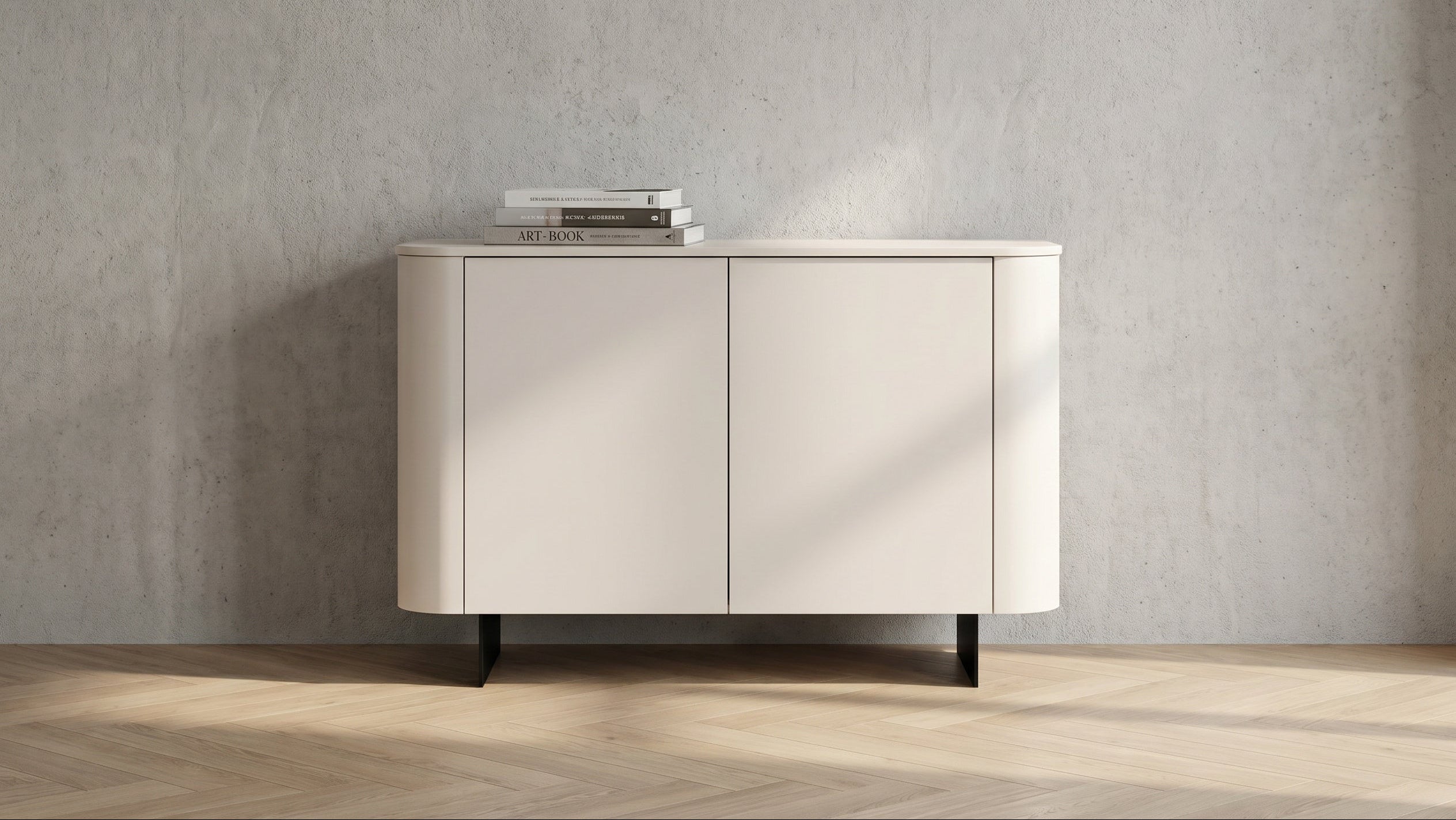 A modern sideboard cabinet with two doors, featuring a curved outer frame, a light beige finish, and black legs, set against a textured gray wall and light wood herringbone floor.